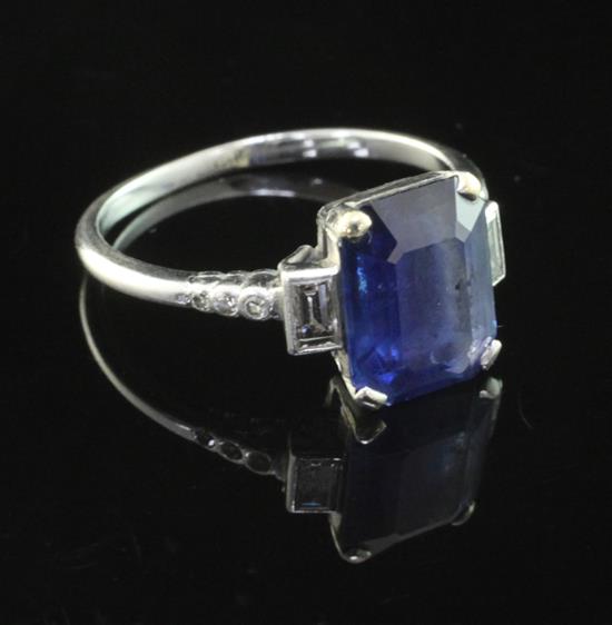 A mid 20th century platinum, sapphire and diamond ring, size 0.